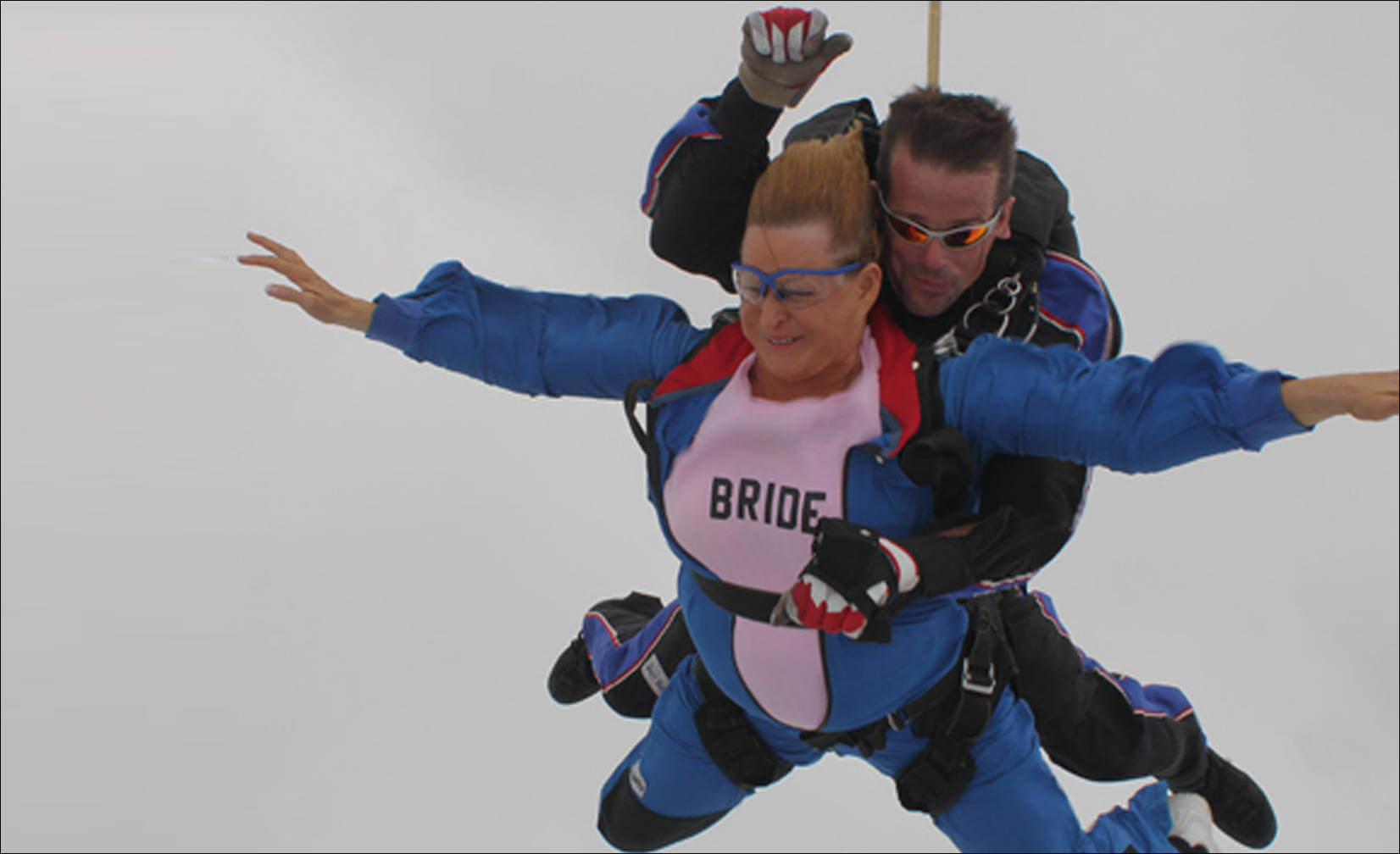 skydives following her 2011 wedding